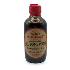 Dark bottle with brown and red label.