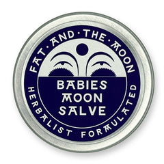 Round metal container with dark purple label and half-moon face.
