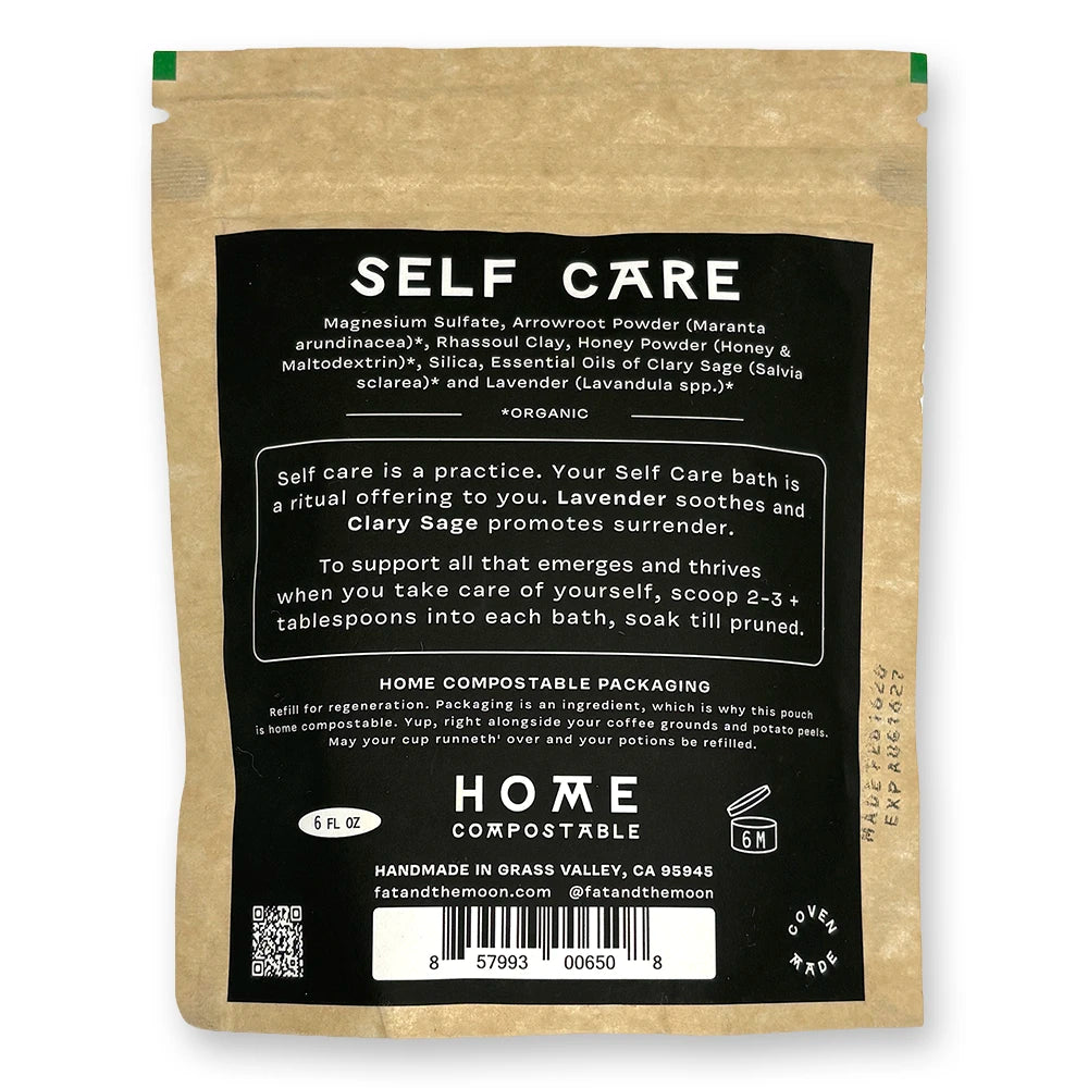 Brown kraft pouch with black and white label with half-moon face.