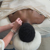 Patient receiving acupuncture on her back.